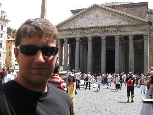 Me at the Pantheon in Rome. It has a huge hole in the top that creates a circle of sunlight inside.