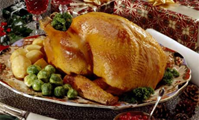 This is just a photo of a nicely cooked turkey. Our turkey will be already sliced, so wont look anything like this.