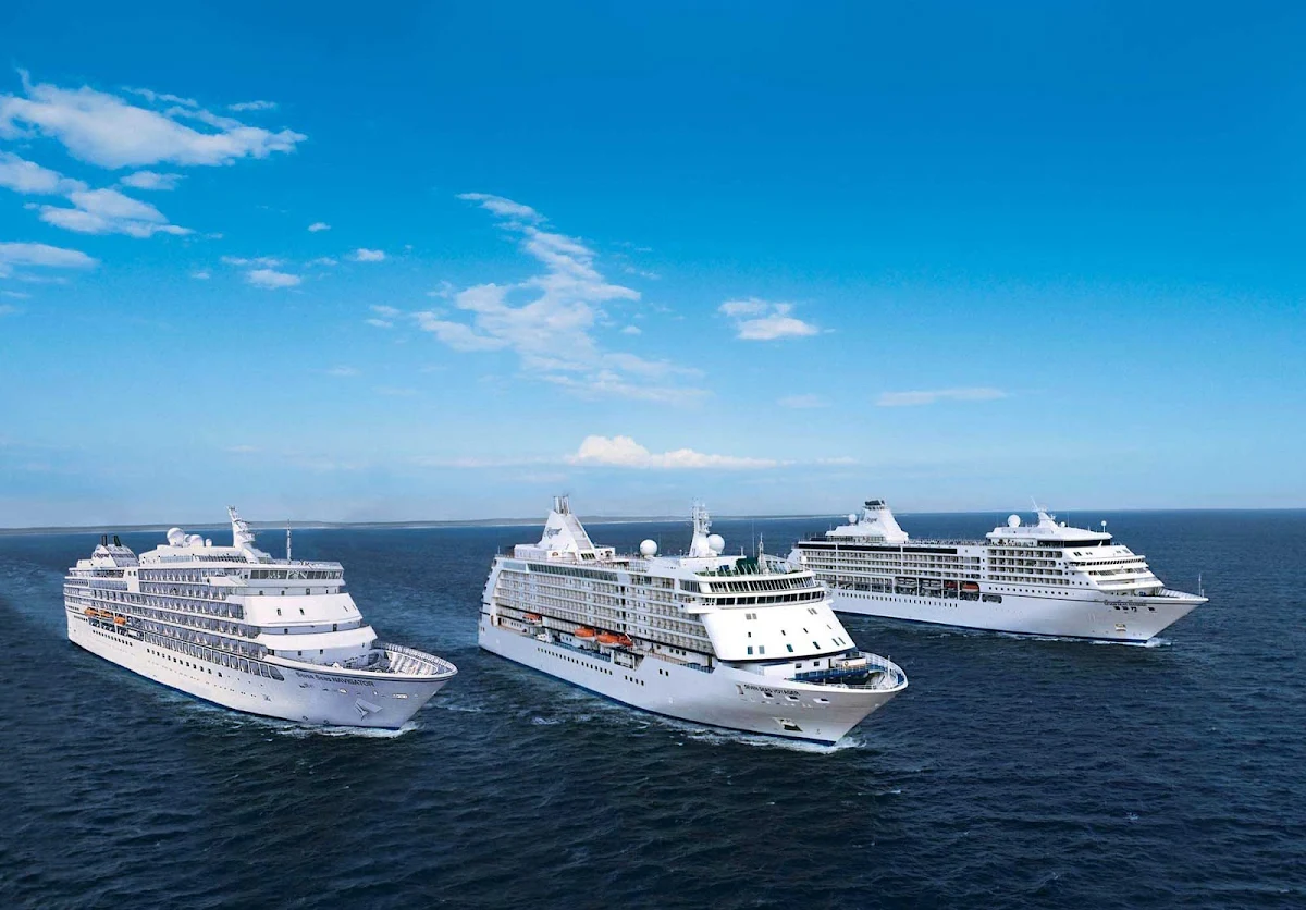 Regent-Seven-Seas-Voyager-Mariner-Navigator - It's triplets! Regent Seven Seas Voyager, Mariner and Navigator sail out to sea.