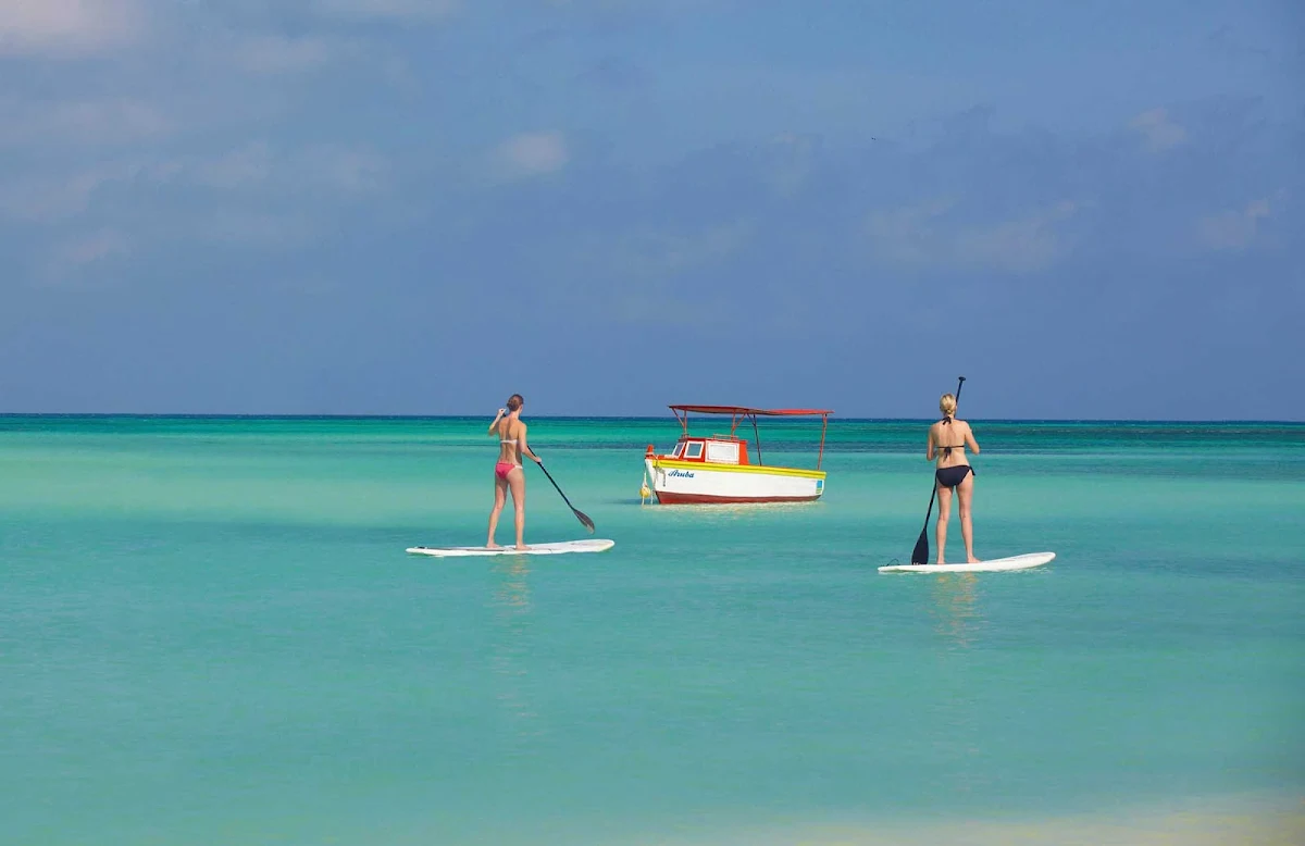 paddleboard-Aruba - Two women on stand-up paddleboards in Aruba.