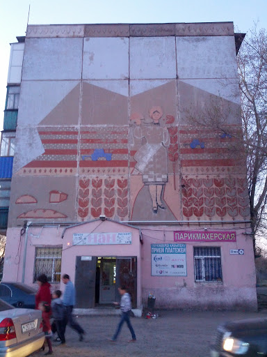 Woman on Building