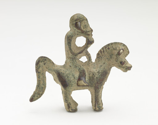 Orament in the form of a monkey riding a horse — Google Arts & Culture