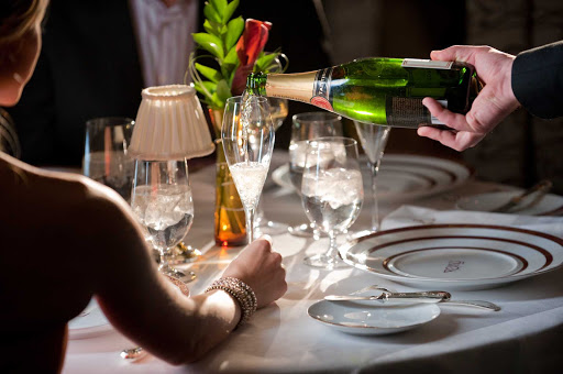 Disney-Dream-Remy-table-setting - Taittinger Brut Champagne poured at Remy, the French restaurant aboard Disney Dream. 