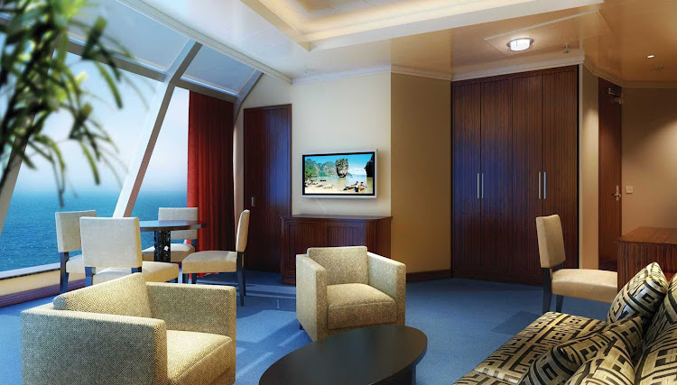 Guests checked into Norwegian Star's Deluxe Owner's Suite have floor-to-ceiling windows and impressive views.