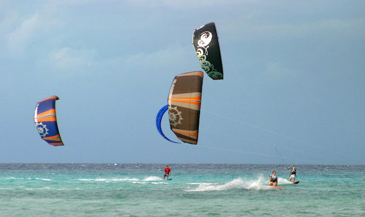 Kitesurfing near Cozumel beaches offers thrills on the water and in the air. 