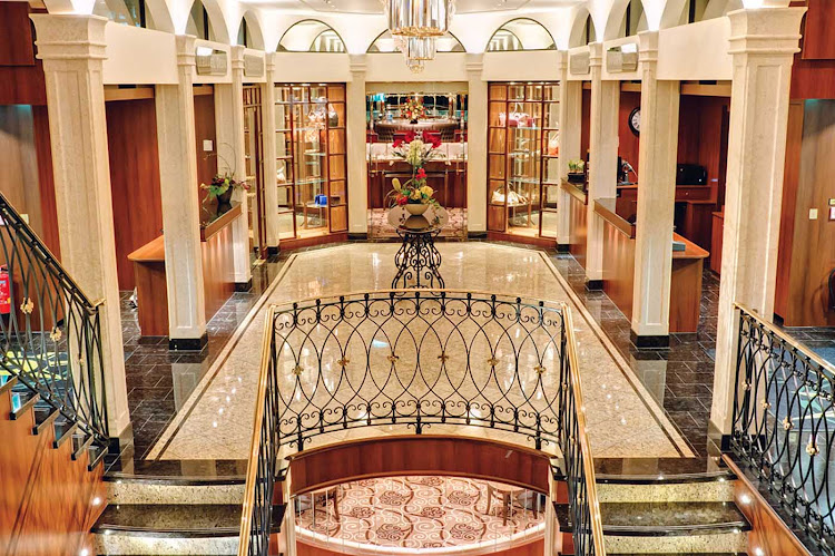 The elegant reception area aboard Tauck's new river cruise ships Inspire and Savor. At 443 feet, the ships are the maximum length for navigating the locks along Europe's waterways. 