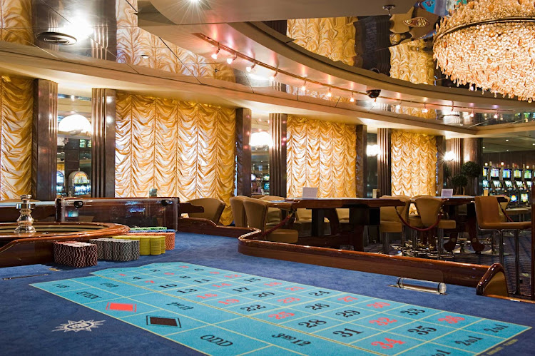 Passengers can test their gaming skills in the Palm Beach Casino during a cruise aboard MSC Armonia.