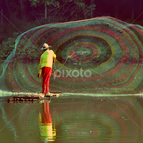 fisherman - menjala ikan by Tamlikho Tam - People Professional People