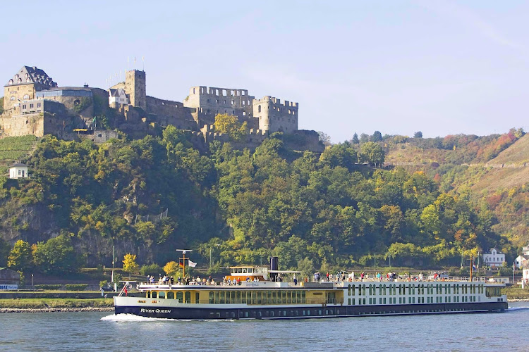 View historic battlements, monuments and lush scenery along the Rhine River during your luxury boutique cruise aboard Uniworld's River Queen.
