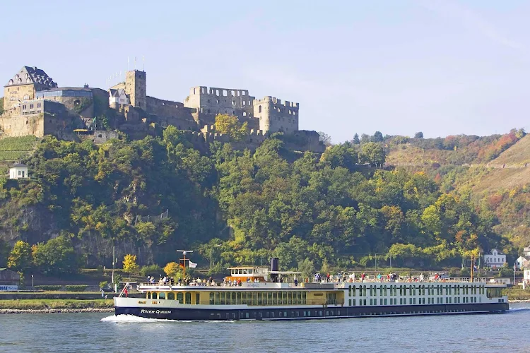 View historic battlements, monuments and lush scenery along the Rhine River during your luxury boutique cruise aboard Uniworld's River Queen.
