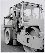 Werkers aan de snelweg; de wals