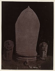 Inscribes slab (Old Javanese language, East Javanese Kawi script) from Candi Lor with a kalamukha on top (rear view); three statuettes (Surya, Nandi, femal dification imade), Residential house. Kediri, Kediri district, East Java province, 900-910 AD.