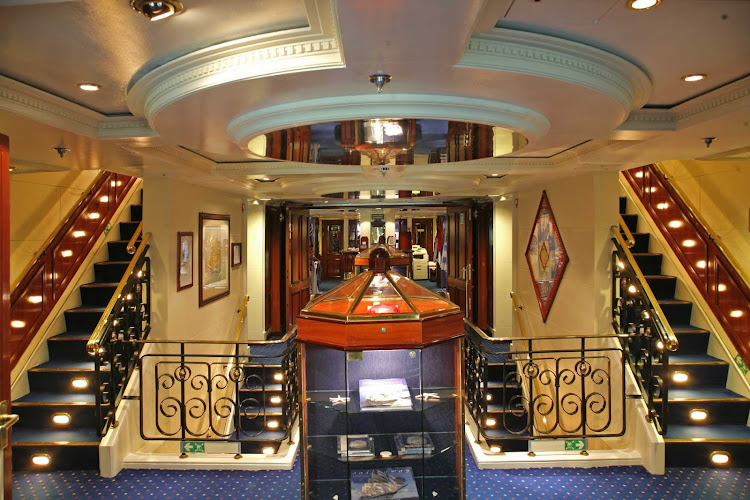 The Royal Clipper features twin blue staircases that lead to the main deck.