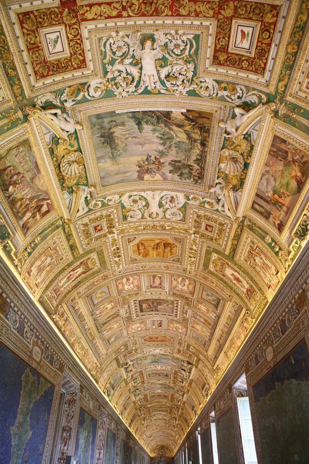 Vatican-Museums-Gallery-of-Maps-ceiling - Visit the Vatican Museums as part of your Rome excursion, and linger at the 16th-century Gallery of Maps to gaze on the beautiful ceiling frescoes. 