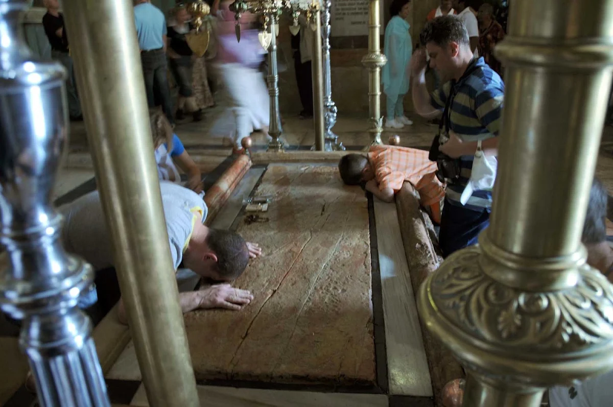 Old-Jerusalem-scene - Prayers go out at a holy site in Old Jerusalem. 