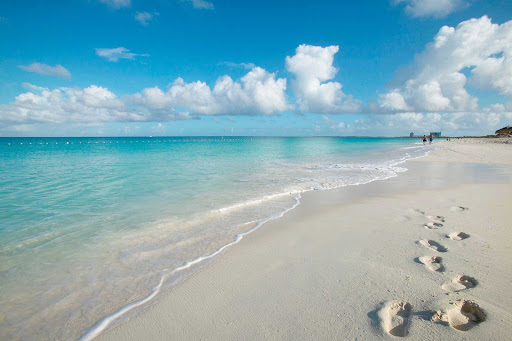 Robinson Crusoe, eat your hear out: Footprints across the white sand beaches of Aruba.