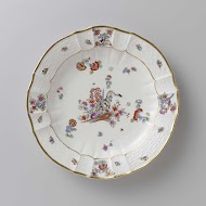 Rond bord, veelkleurig beschilderd met een Kakiemon-decor