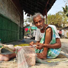 fish net by Subrata Chatterjee - People Portraits of Men