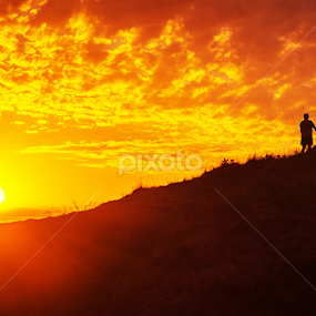 The man and the sunset by MIhail Syarov - Landscapes Sunsets & Sunrises