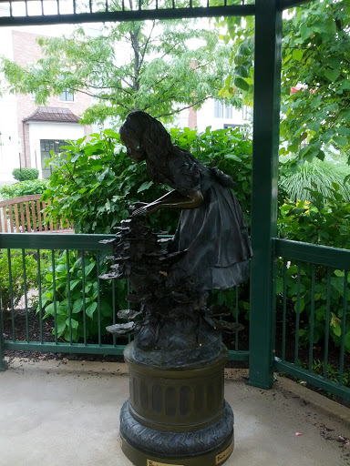 Girl and Butterfly Statue