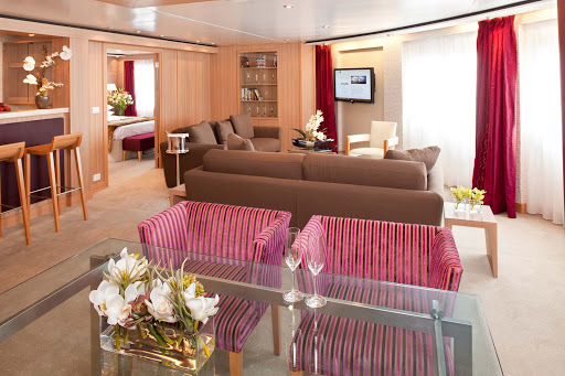 Seabourn_Odyssey_Sojourn_Quest_Signature_Suite - The Signature Suite on Seabourn Sojourn lets you spread out. It has a dining area that fits six people, a private bedroom and bathroom with a large whirlpool tub, a stocked pantry and wet bar, and complimentary wi-fi.