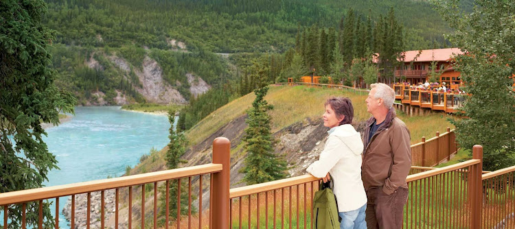 Taking in the scenic landscape from the deck of Denali Princess Wilderness Lodge in Alaska.