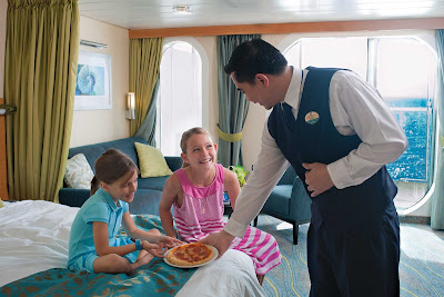 Pizza, mademoiselles? Room service in a stateroom on Allure of the Seas.