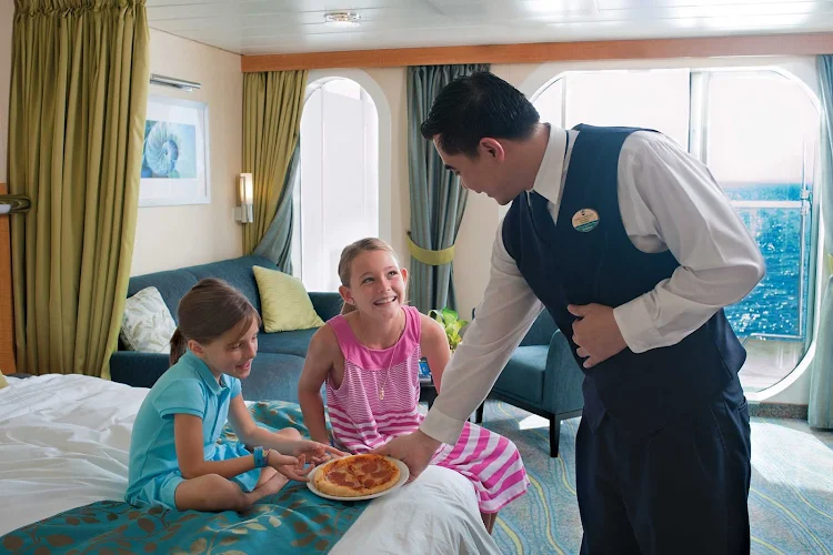 Pizza, mademoiselles? Room service in a stateroom on Allure of the Seas.