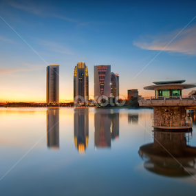 Building at sunset by Fadly Bert - City,  Street & Park City Parks