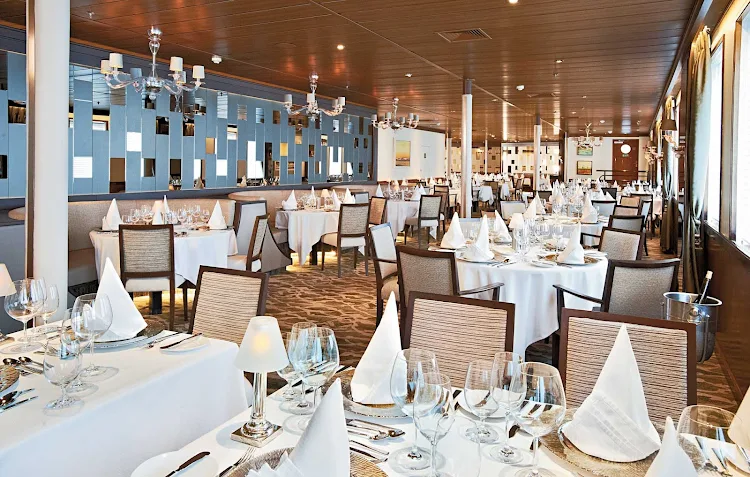 Experience the ambience of  your Windstar ship's contemporary  dining room, Amphora.