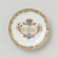 Saucer from the 'Swellengrebel service' with a double crowned monogram and a border with floral scrolls