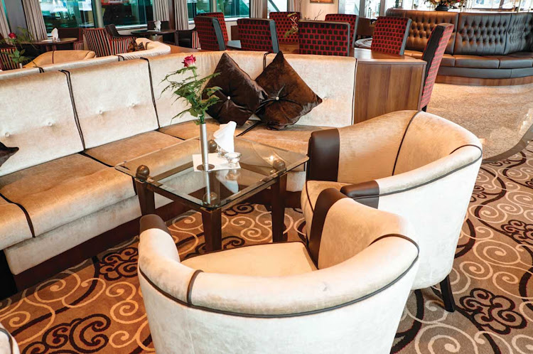 The lounge aboard Tauck's new river cruise ships Inspire and Savor. At 443 feet, the ships are the same length as Viking River Cruises' Longships but carry 130 guests, compared to Viking's 190. 
