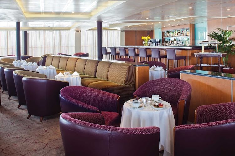 Unwind after a day of sightseeing in the Gallieo Lounge on deck 11 of Seven Seas Navigator.