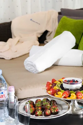 Relax in a Lido cabana aboard Holland America Line's Eurodam and enjoy some iced fruit skewers and a glass of bubbly.