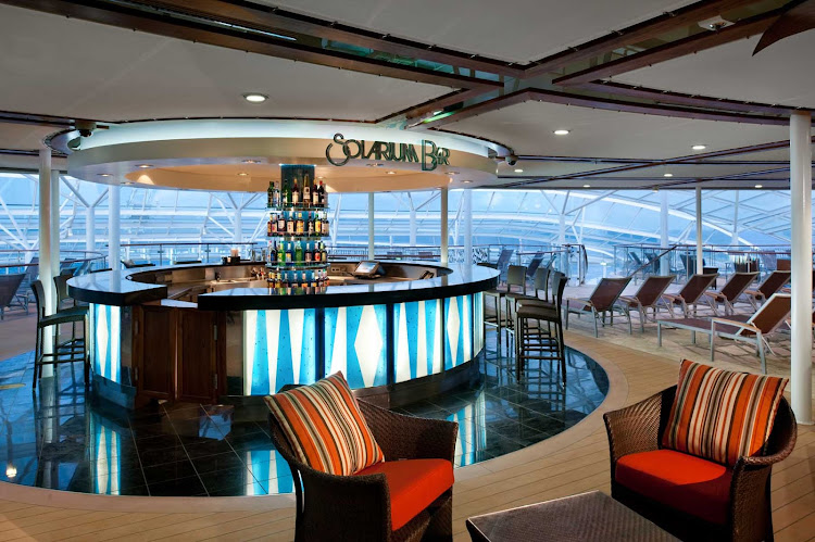 Have a drink or chat up new friends at the Solarium Bar aboard Allure of the Seas.
