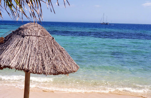 beach-view-Castaway-Island-Fiji - The exquisite view of the reef from the beach on the west side of Castaway Island. Some bures, or cottages, are only 20 steps from the water.