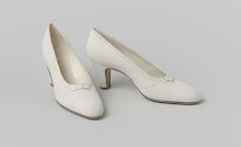 Paar pumps van twee soorten leer