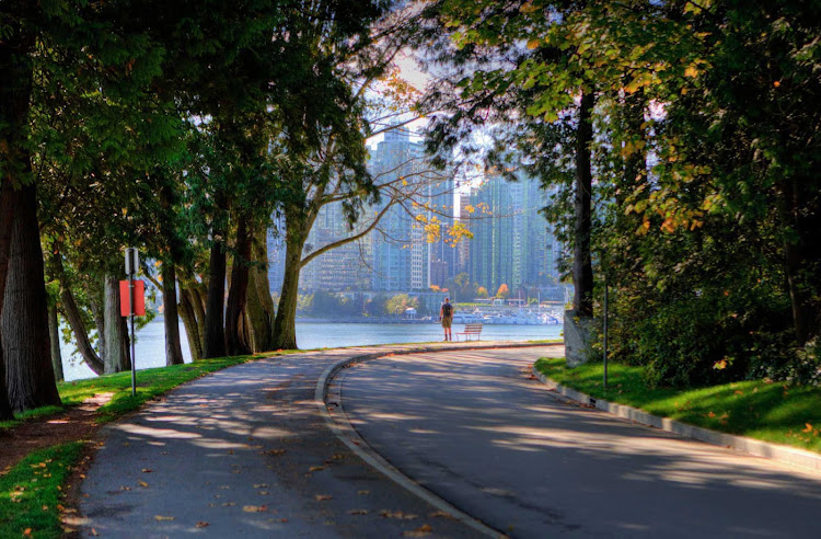 View of the seawall and part of the downtown high-rise buildings in Vancouver, British Columbia during autumn.