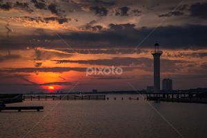 The Broadwater Marina Sunset by Ron Maxie -  