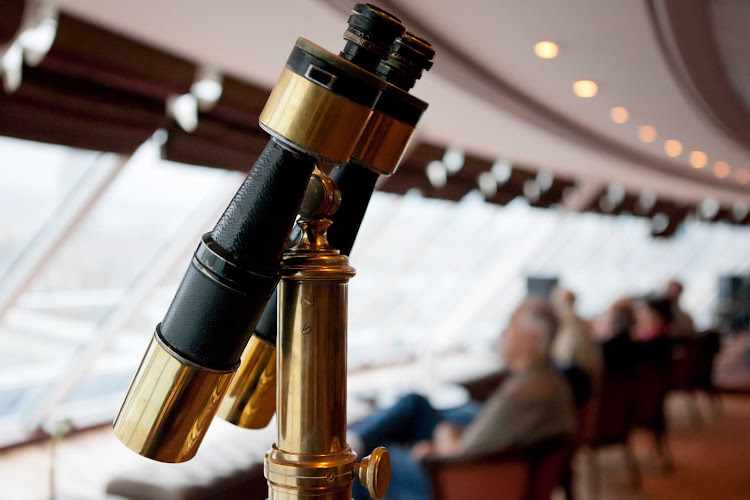 Look through binoculars for close-up views of the scenery while dining in the Looking Glass on your Azamara cruise.