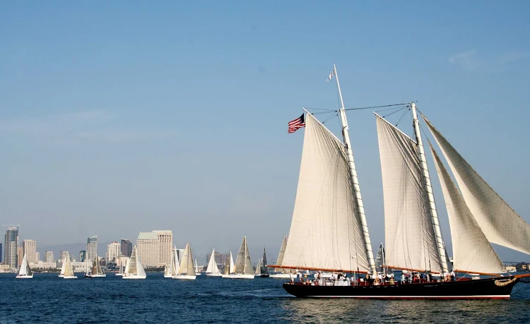 Downtown San Diego skyline with sailboats.