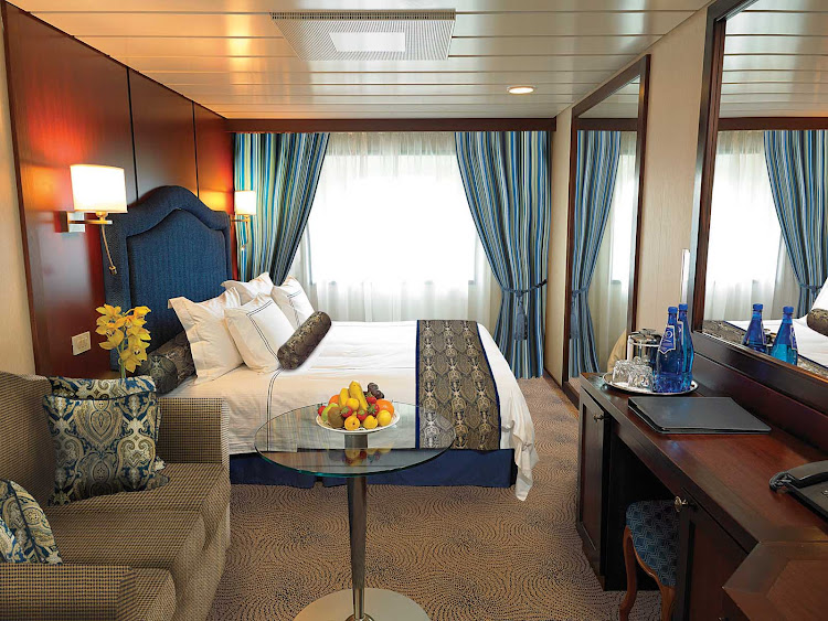 The C Level Deluxe Ocean View staterooms on Oceania Regatta contain custom-designed furnishings, queen or two twin bed accommodations, spacious seating area, vanity desk and breakfast table. At 165 square feet, they're located on decks 4,6 and 7.   