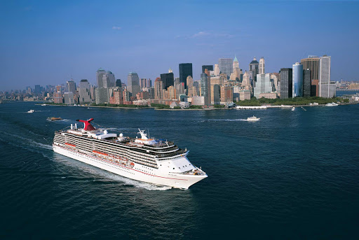 Carnival-Miracle-New-York - Carnival Miracle cruises past New York's skyline.