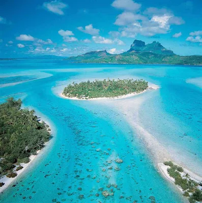 Seeing Bora Bora by air allows views of Mount Pahia and Mount Otemanu.