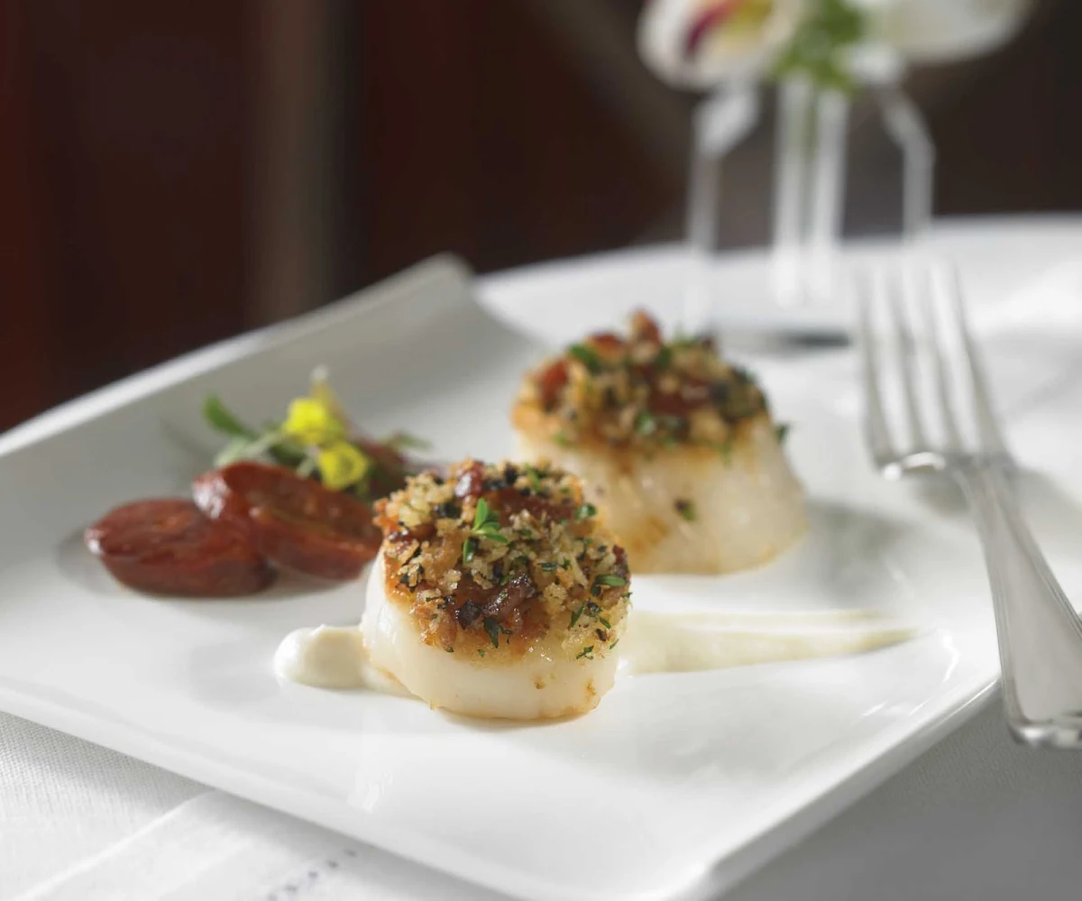 Royal-Caribbean-dining-sea-scallops-chorizo - Pan Seared Sea Scallops and Chorizo, available from the kitchen of your Royal Caribbean ship. 