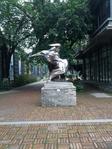 Silver Statue of T.I.T Creative Zone