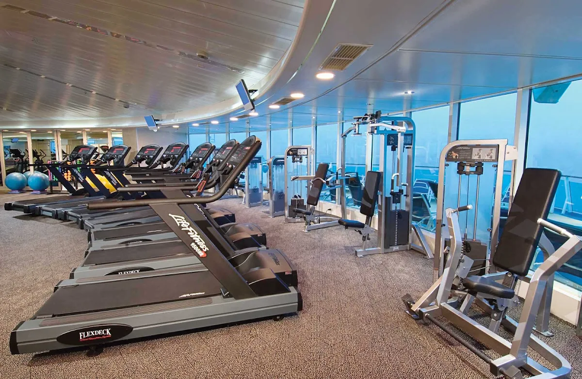 Enchantment-of-the-Seas-ShipShape - Work up a sweat with a view of the sea at Enchantment of the Seas' ShipShape Fitness Center.