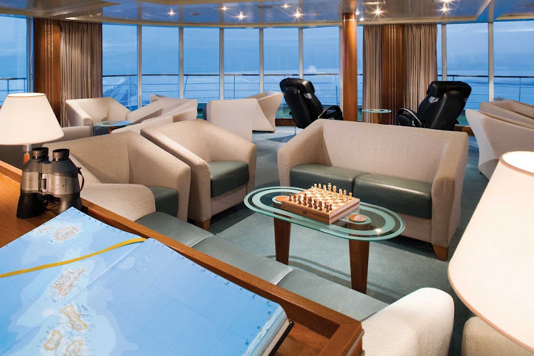 Enjoy a quiet board game, a complimentary drink, and a look at the radar screen in the Observation Lounge on board Silver Whisper.
