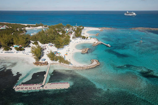 Coco-Cay-aerial-Royal-Caribbean - Walk along the white beaches and turquoise lagoons of CocoCay in the Bahamas. The east end of the private island is where the recreational activities take place, with beaches facing a coral basin where you can see rays, tropical fish and occasional manatees.  