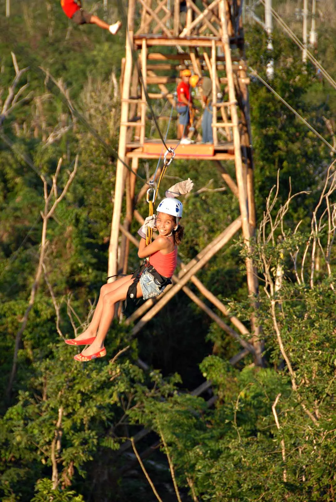 zipline-girl-Cozumel - Zip lining on Cozumel is a thrill ride for all ages.